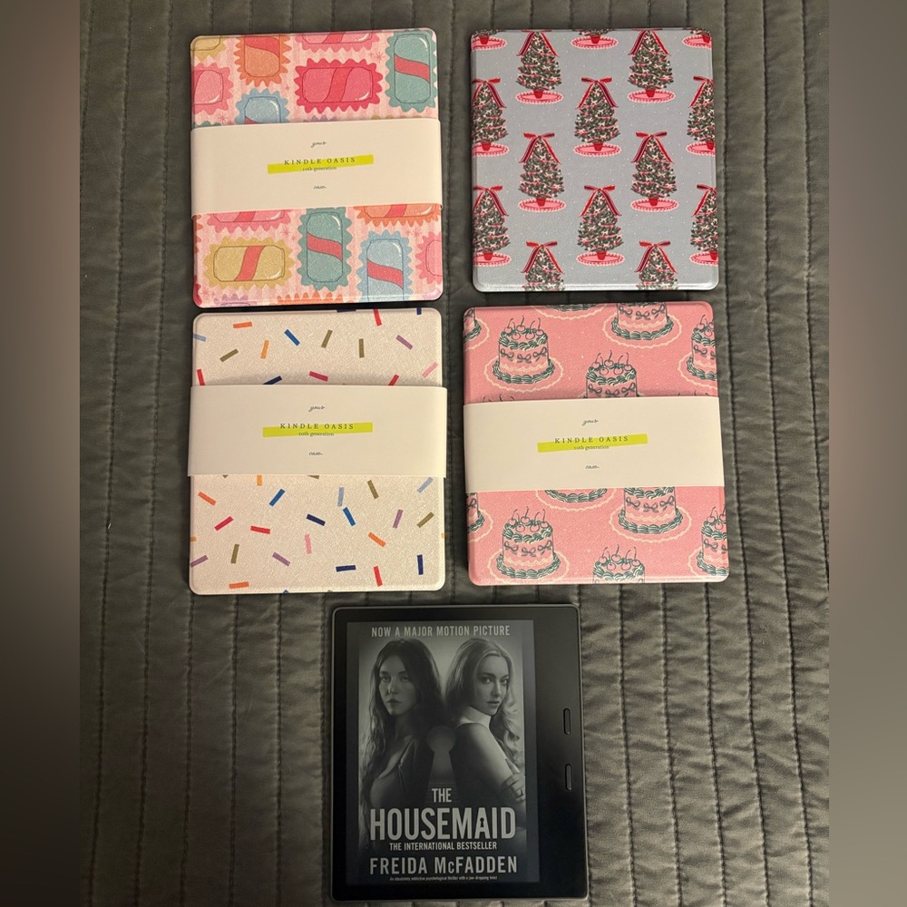 Kindle Oasis Excellent Condition with Page the Shop Cases